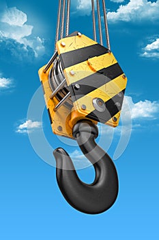 Crane hook on the sky background.
