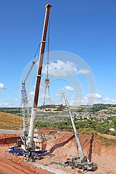 Crane lifting a bridge beam