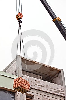 Crane lifting cargo