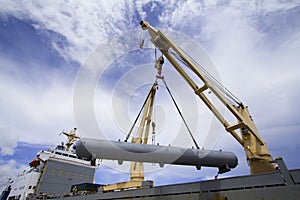 Crane lifting cargo photo