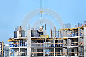 Crane lifting cement mixing container