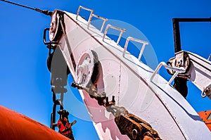 A crane is lifting a heavy object