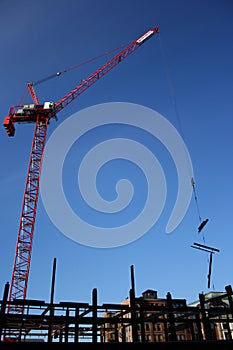 Crane lifting steel girders