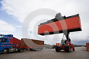 Crane lifts a container