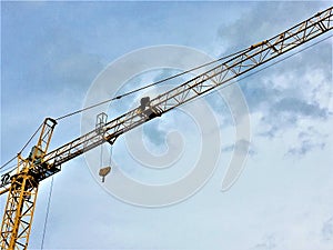 Crane, man and the sky