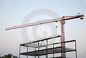 Crane and metal structure building construction site