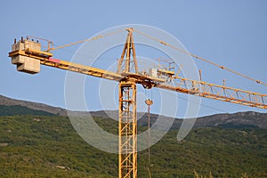 Crane and a mountain