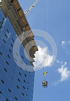 Crane moving equipment at construction site