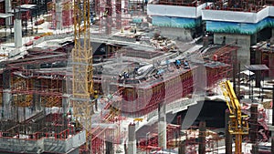 Crane over building under construction site