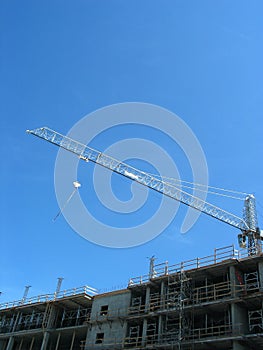 Crane over modern building