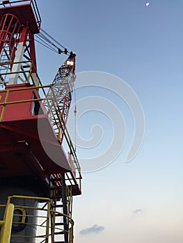 Crane at port side leg at offshore jack up rig.