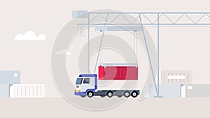 The crane puts the container on the truck platform