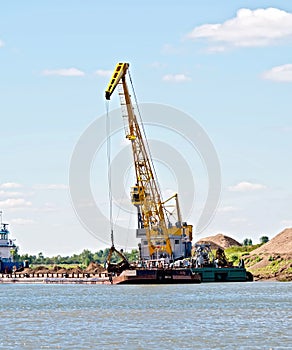 Crane river with barge