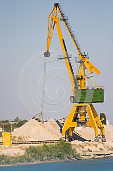 Crane on riverbank photo