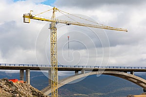 Crane and scaffolding structures intended for the construction of a bridge in Spain