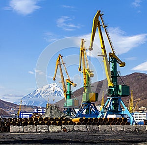 Crane at the scrapyard in the seaport