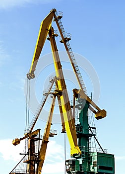 Crane at the scrapyard in the seaport