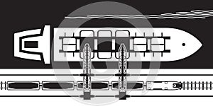 Crane transfers ore from railway wagons to an industrial ship