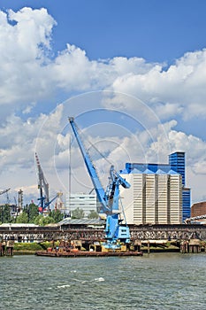 Crane vessel moored in Port of Rotterdam on a sunny day