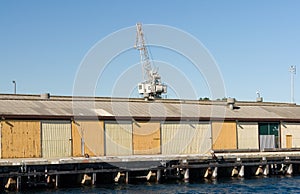 Crane on wharf cargo sheds