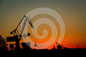 Crane at work - industrial silhouette