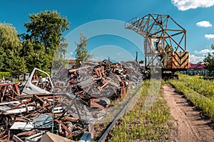 Crane at work in a metal dumpsite