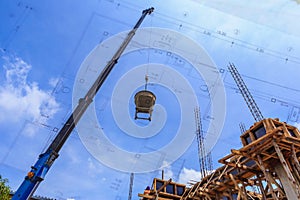 Crane working in construction on blue sky