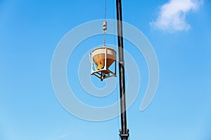 Crane working in construction on blue sky