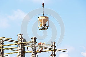 Crane working in construction on blue sky