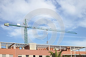 A crane working on the construction of a building
