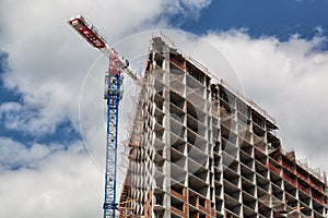 Crane works at construction