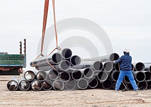 Crane works (pipes unloading)