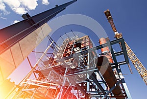 cranes beams on construction of industrial factory