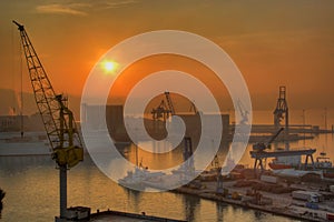 Cranes and boat at the port of Ancona