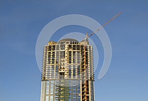 Cranes and building construction of a skyscraper