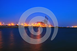 Cranes at the cargo terminal in the evening