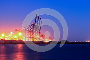 Cranes at the cargo terminal in the evening