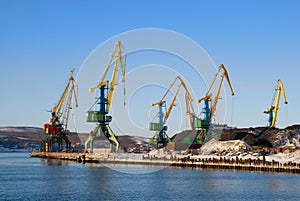 Cranes, coal and vessel