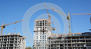 Cranes construction. Building construction growth and global construction industry and gdp growth concept