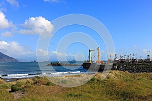 Cranes and Fishing Boats at Port Orford, Oregon Coast, Pacific Northwest, USA