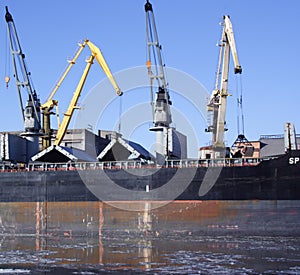 Cranes loading ship