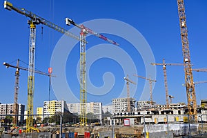 Cranes and new building construction site