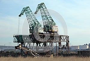 Cranes and scrapyard photo