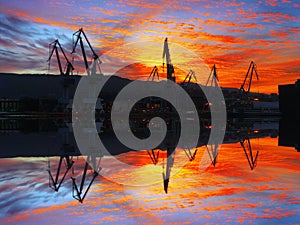 Cranes in Sestao at sunset