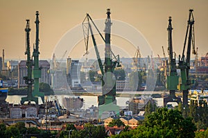 Cranes of the shipyard in Gdansk at sunset, Poland