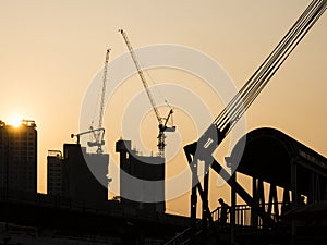 Cranes working on Building Construction site