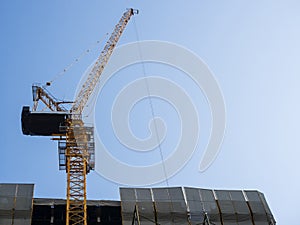 Cranes working on Building Construction site Industrial background