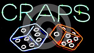 Craps and dice gambling neon sign.