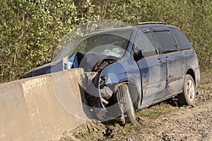 Crash. The car crashed into a concrete fence. Damage and car insurance.