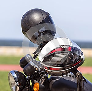 Crash Helmets on a Motorbike